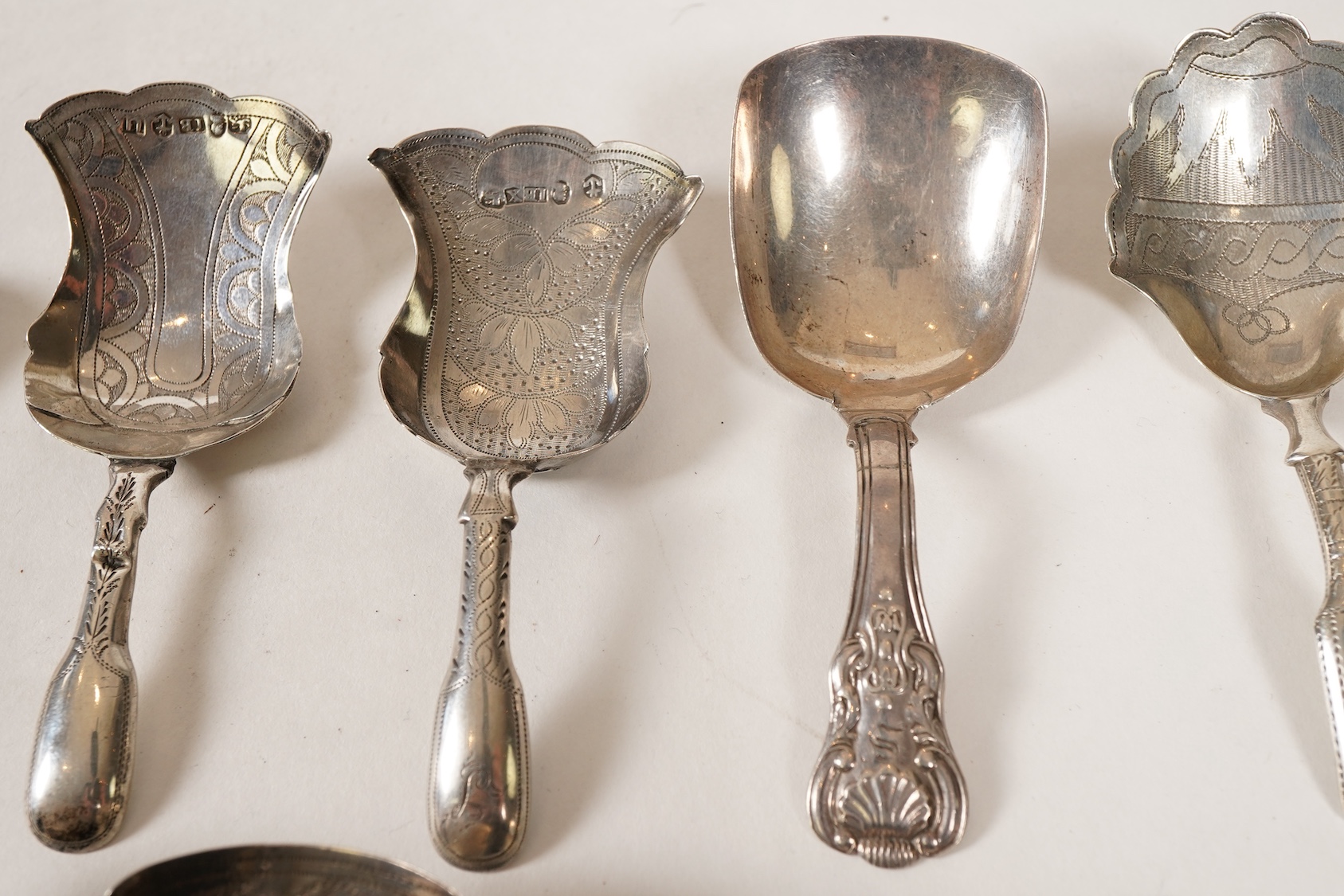 Ten assorted mainly 19th century silver caddy spoons, most with shovel bowls